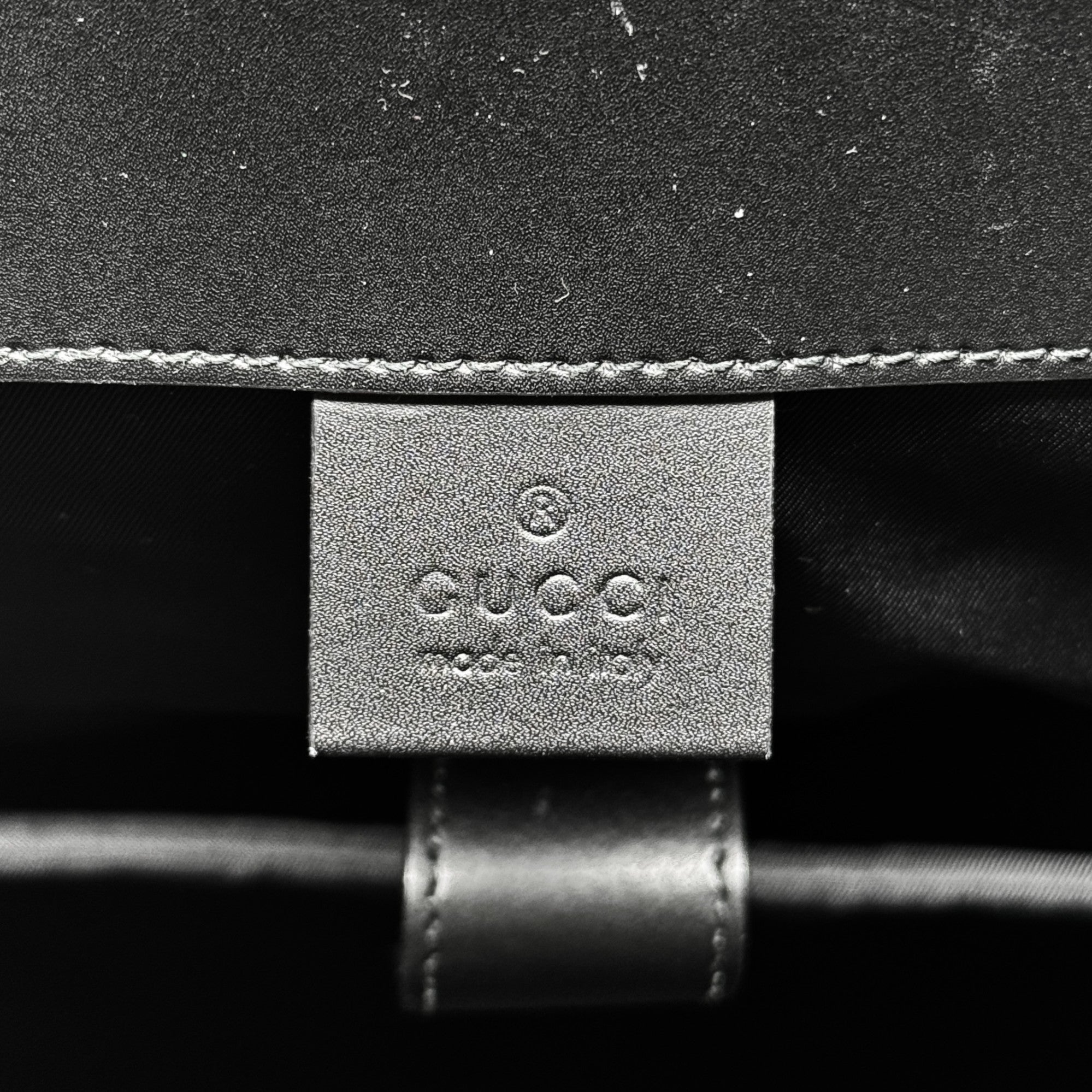 Gucci Brown GG Supreme Double Buckle Backpack
