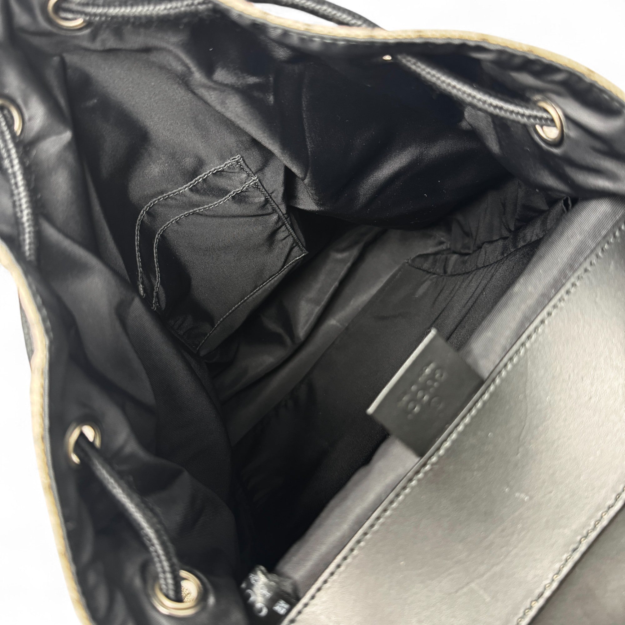 Gucci Brown GG Supreme Double Buckle Backpack