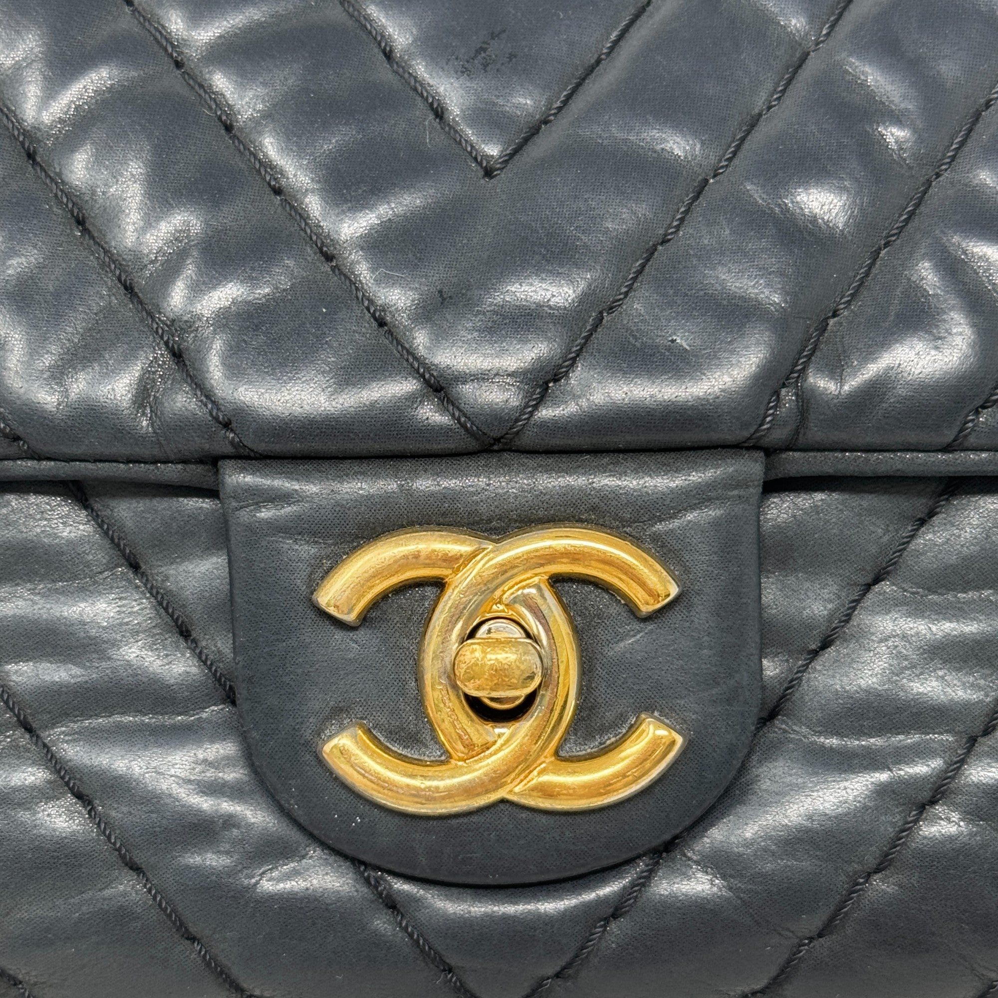 Chanel Black Chevron Large Surpique Flap