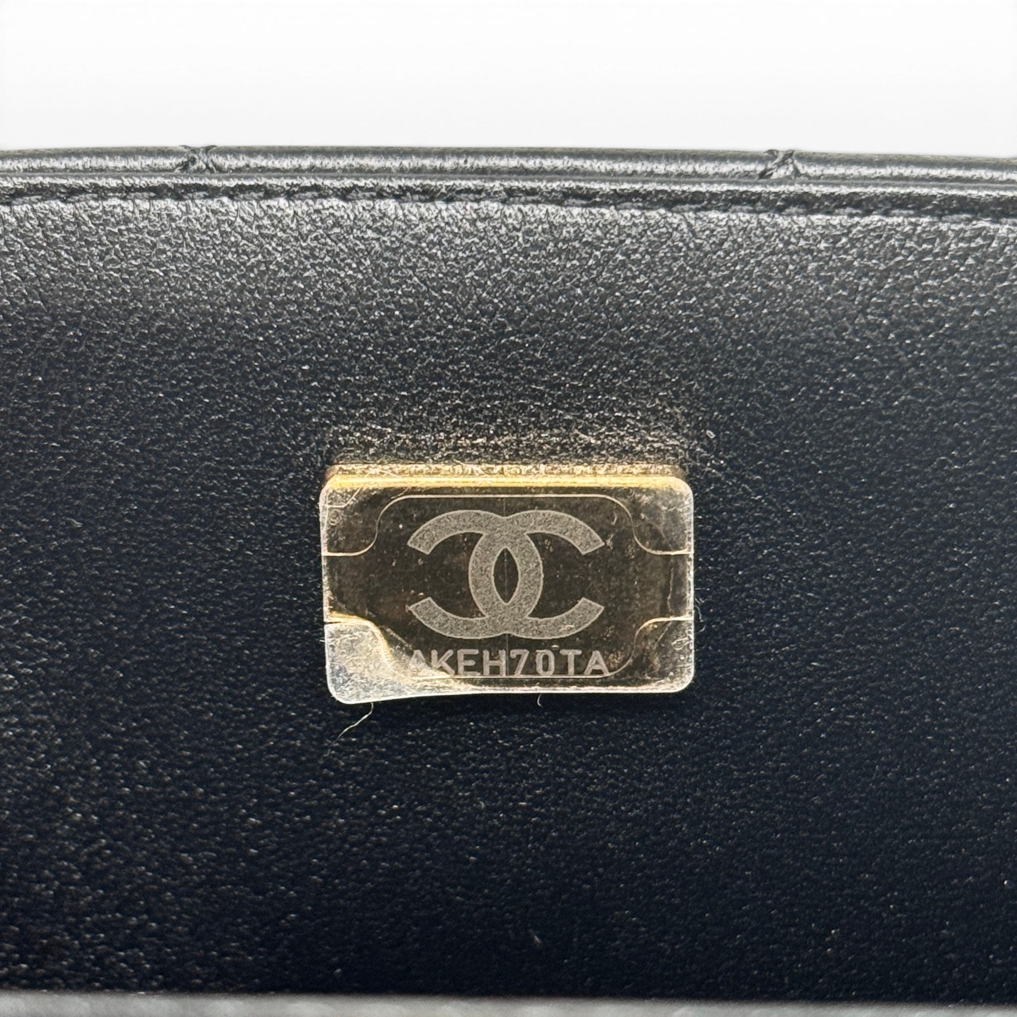 Chanel Black Lambskin Mini Classic Handbag