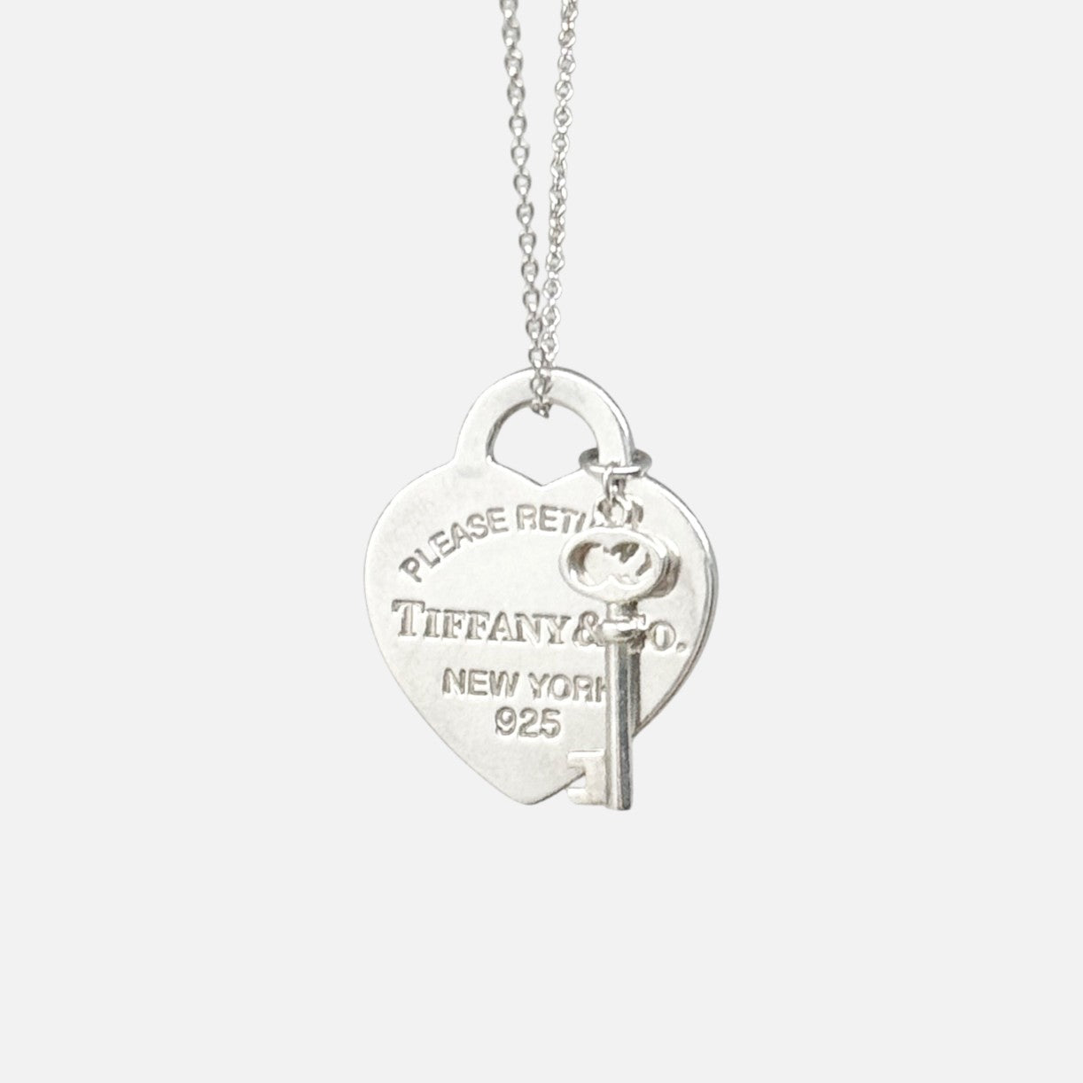 Tiffany & Co. Silver Heart Tag Key Pendant Necklace