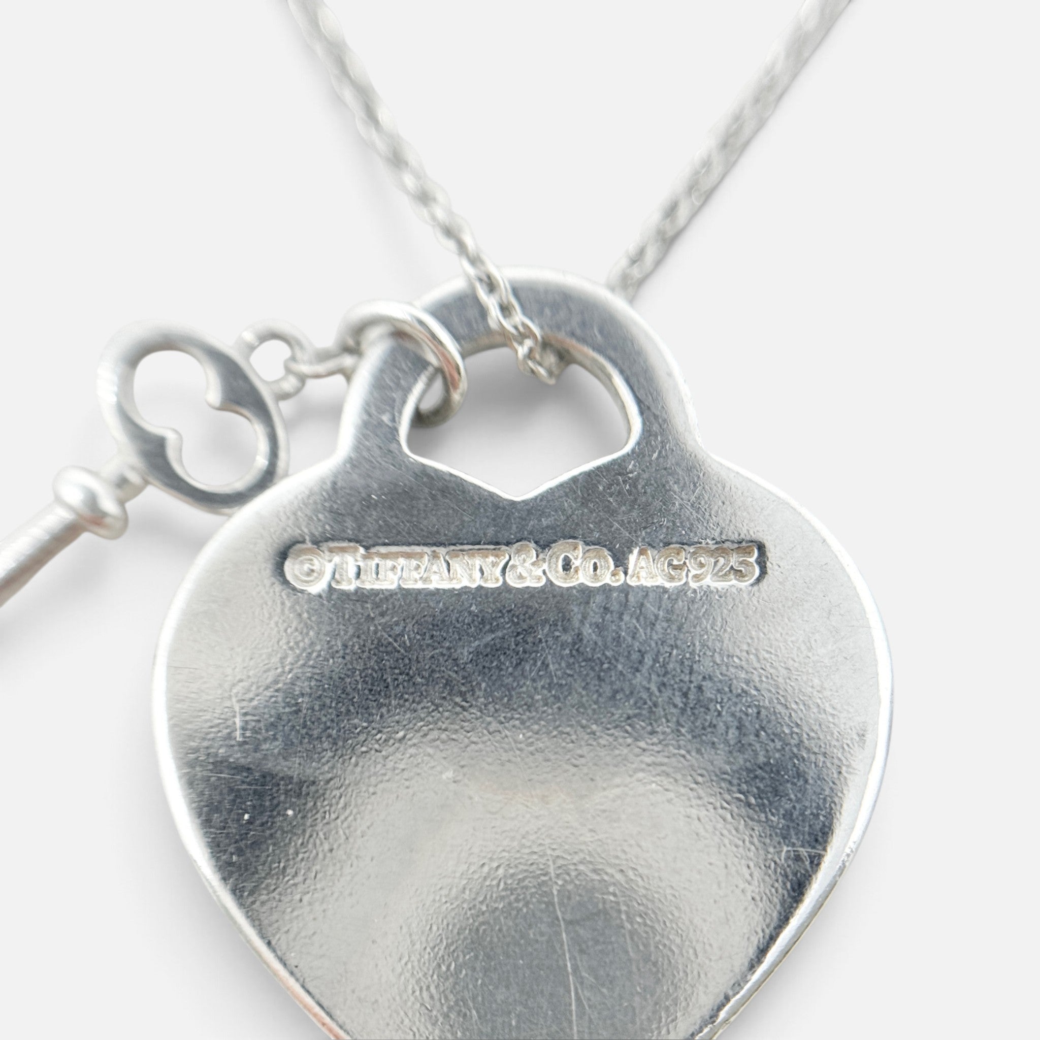Tiffany & Co. Silver Heart Tag Key Pendant Necklace